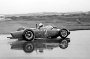 Phil Hill in the wet at Aintree with his world championship winning Ferrari at the 1961 British Grand Prix