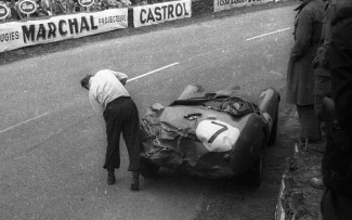 Eric Thompson with his battered Lagonda at the 1954 Le Mans 24 hour race
