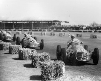 “Toulo” in Enrico Plate’s Maserati 4CLT/48 leads Louis Rosier and Philippe Etancelin in their Talbot-Lago’s in the 1950 British Grand Prix at Silverstone. (Photo Ferret)