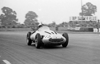 Manzon at the wheel of the streamlined Gordini grand prix car that ran in the 1956 season.