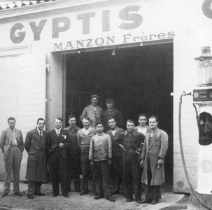 Robert, third from the right, outside the family garage in the 1940s