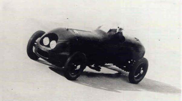 The streamlined Hotchkiss competing at Brooklands. The bodywork had been cleaned up after the record attempts at Montlhery where a further two headlights had been added