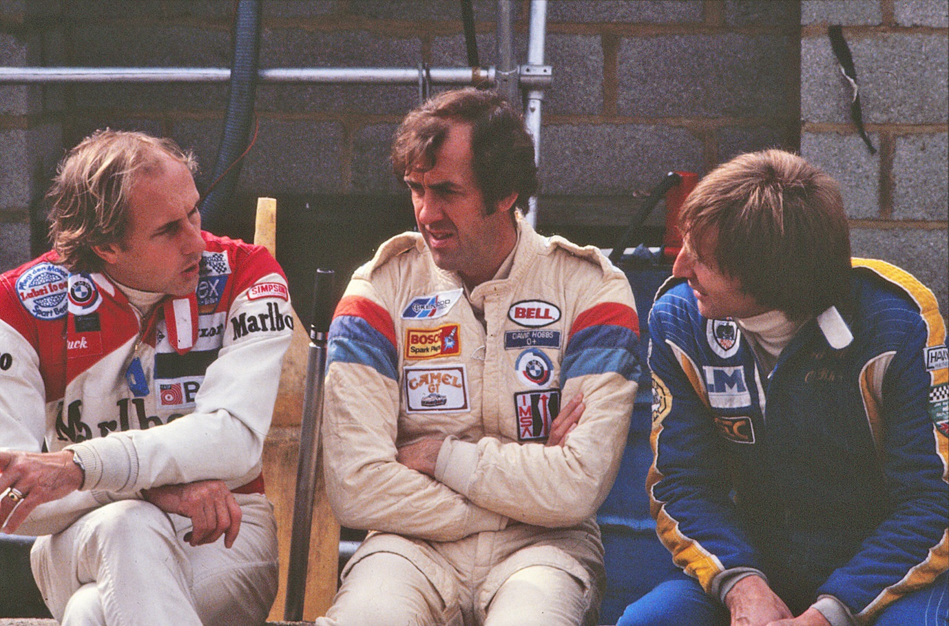 Hans-Joachim Stuck, left with fellow Club members David Hobbs and Derek Bell