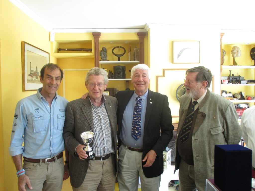 Graham Gauld receiving the annual Jean Sage Award during the GPDC Luncheon. L to R : Emanuele Pirro (Vice President), Graham Gauld, Howden Ganley (President) and Theo Huschek (Secretary General)