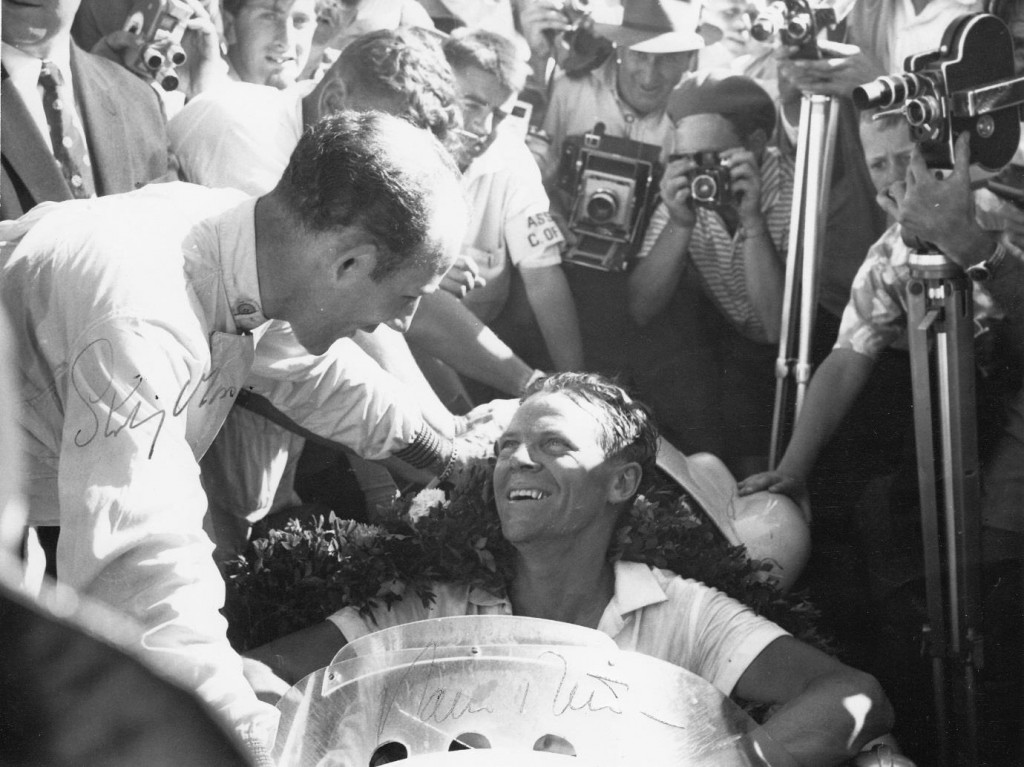 Paul Frere is congratulated by Stirling Moss in winning the South African Grand Prix in 1960 in a Cooper. It was a Formula Libre event