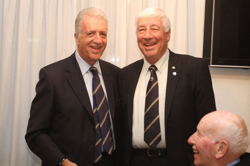 Piero Ferrari, Vice-President of Ferrari with his new Grand Prix Drivers Club tie poses with club President Howden Ganley and a smiling John Surtees. (Photo Axel Schmidt)