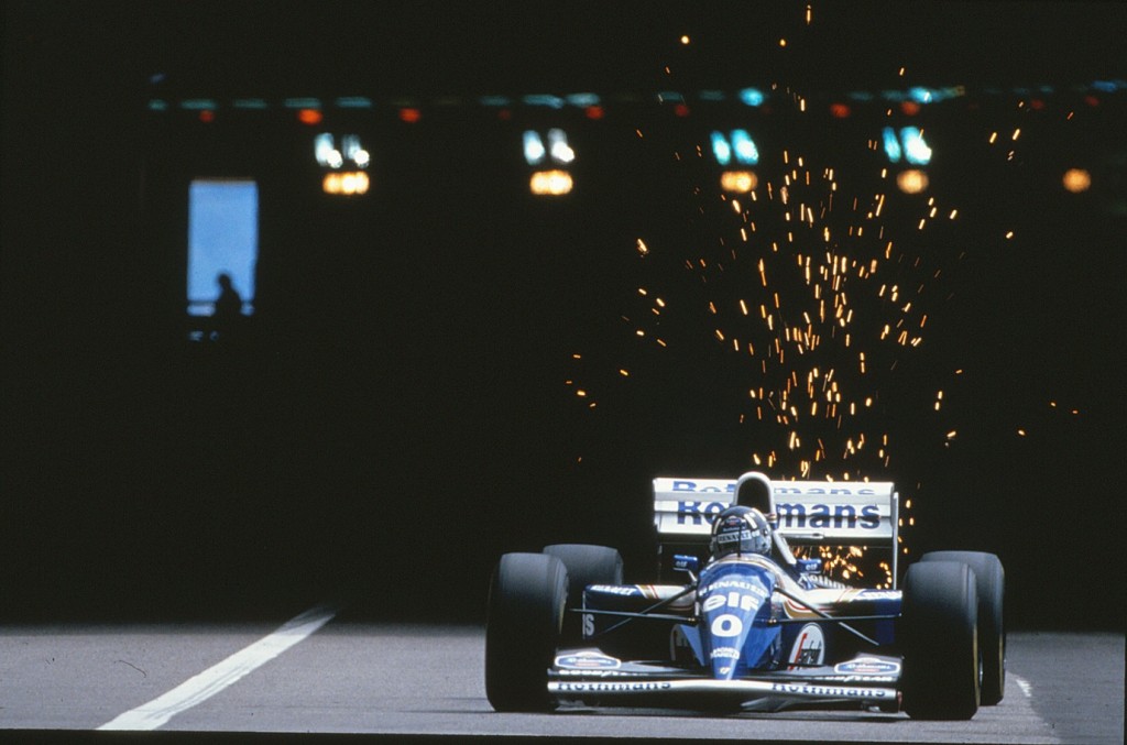 Damon Hill kicking up the sparks leaving the tunnel at Monaco with the Williams