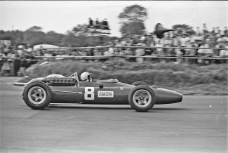 Chris Amon in action at Silverstone in the Ferrari 312 63/V12 in the British Grand Prix of 1967. He finished 3rd that year.