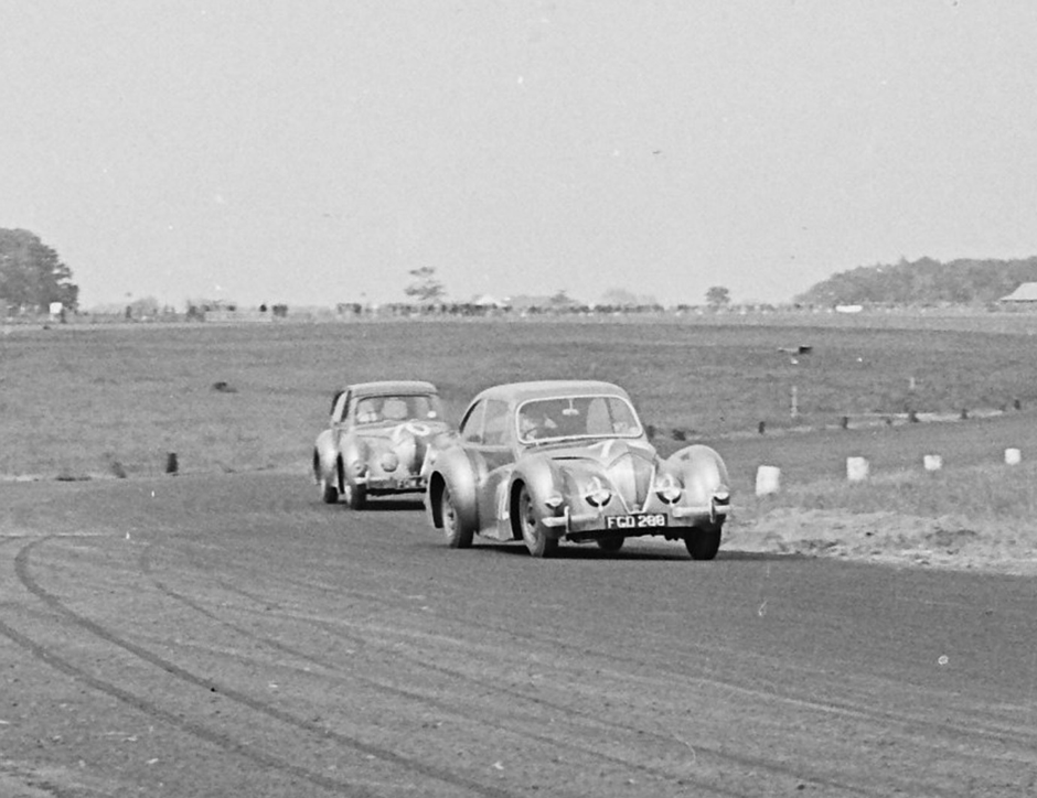 Ken Downing in his Healey Elliot saloon being chased by Harry Havelock-Slack’s shooting-brake version at Charterhall in 1952. 