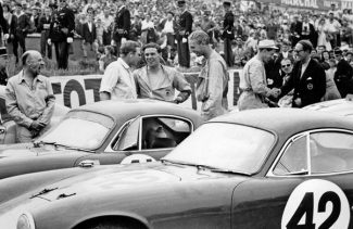 Whitmore, center right with Jim Clark on the grid for the 1959 Le Mans 24 Hours with the Border Reivers’ Lotus Elite.