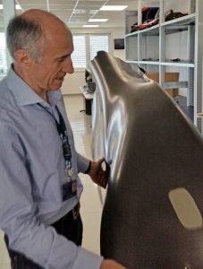 Franz Tost demonstrates the lightness of an entire F1 side body panel