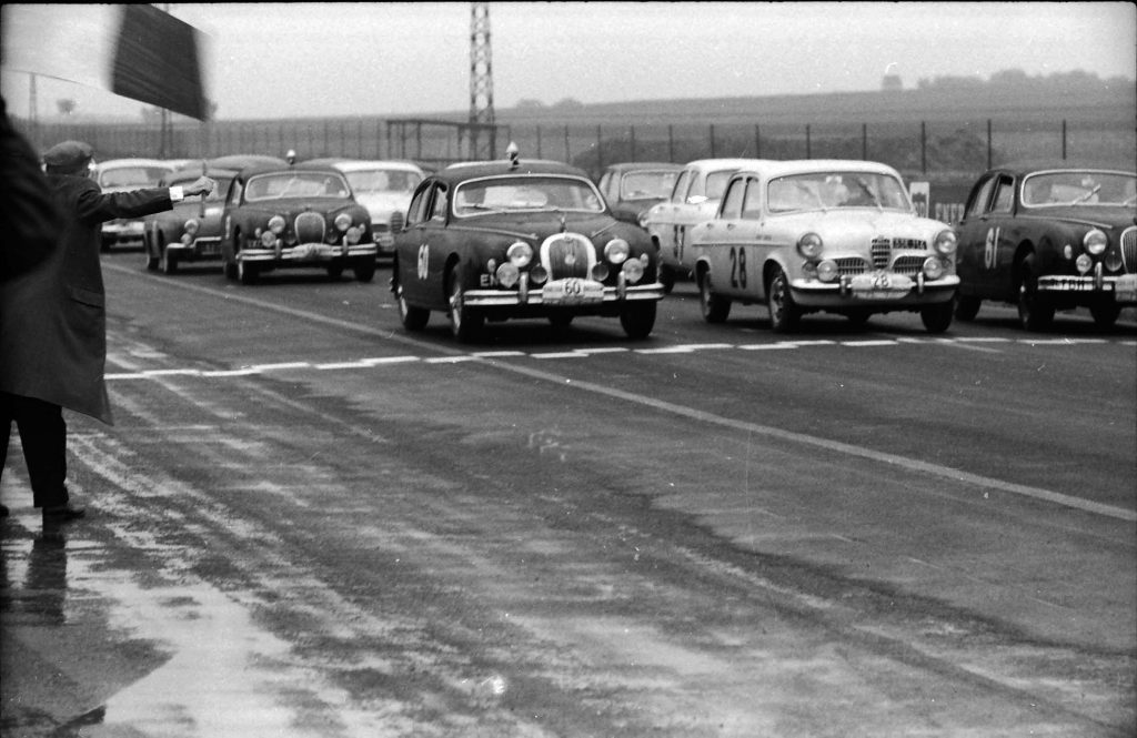 Bernard Consten in his Alfa Romeo at Reims squashed between the 3.8 litre Jaguars of Tommy Sopwith and Peter Whitehead. A year later and Consten switched to Jaguar and won the Touring Car Class.