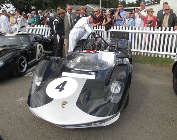 Karun Chandhok, on the left, rear, took time out from commentating to race this McLaren Mk 1A at Goodwood but suffered from mechanical problems (Photo Ganley)