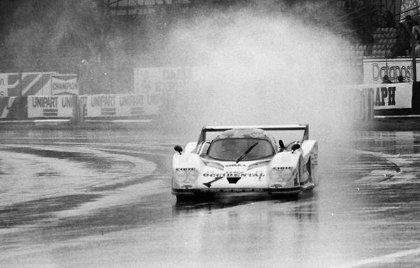Guy at Silverstone in 1981 with the big Lola T600 its ground effects throwing up the spray