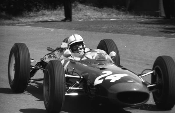 John Surtees at the wheel of the Bowmaker Lola T4 at Aintree 1962