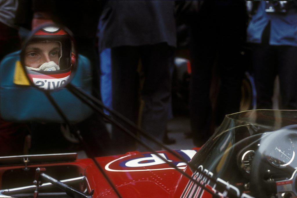 Niki Lauda in the mirror of his March-Ford before the 1972 Monaco Grand Prix. Photo: Grand Prix Photo