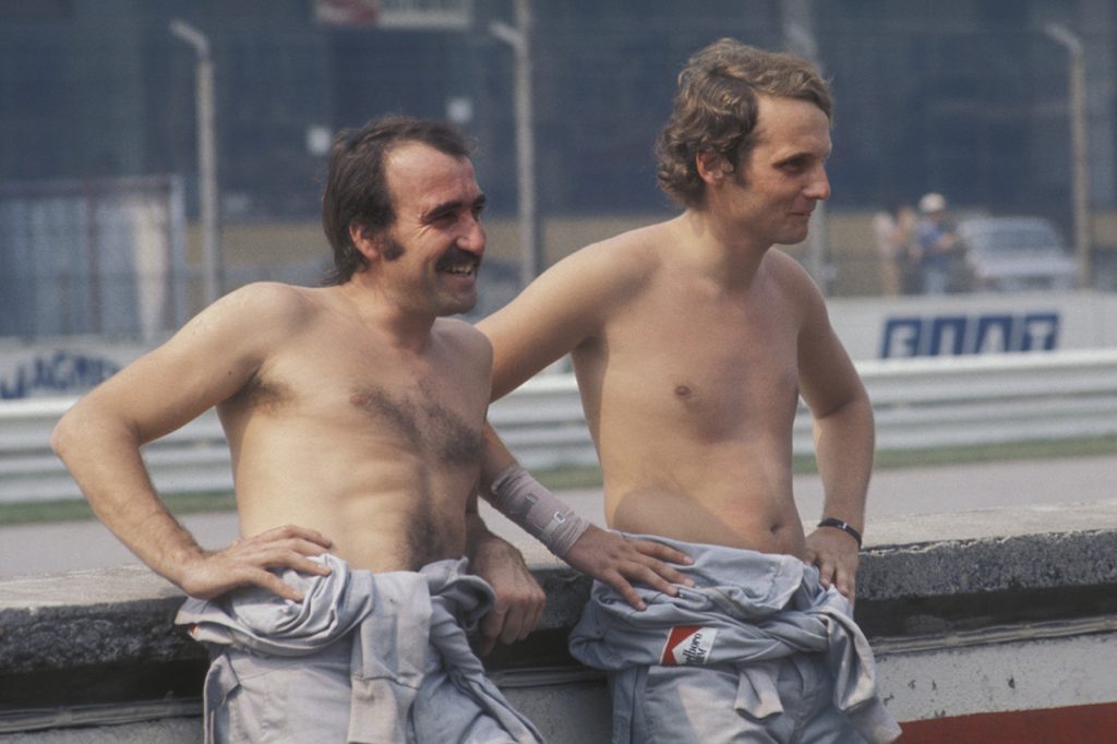 BRM drivers Clay Regazzoni and Niki Lauda relax in the pits at Monza before the 1973 Italian Grand Prix. Photo: Grand Prix Photo