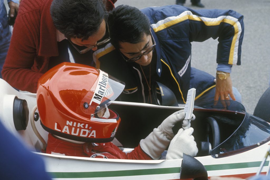 Niki Lauda with Ferrari technical director Mauro Forghieri and team manager Daniele Audetto during practice for ithe 1976 Italian Grand Prix at Monza. Photo: Grand Prix Photo