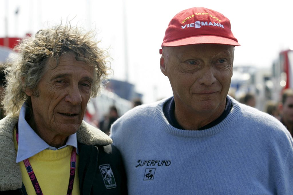 Niki Lauda meeting his rescuer from his accident in 1976 Arturo Merzario after qualifying for the 2006 European Grand Prix at the Nurburgring. Photo: Grand Prix Photo