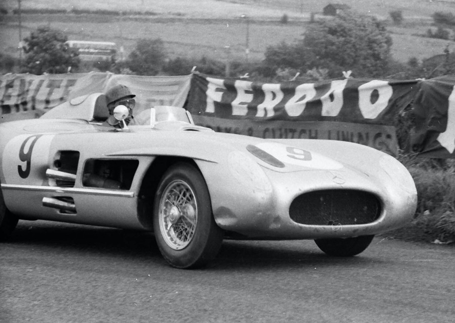 Juan Manuel Fangio exits the hairpin on the Dundrod circuit in Ireland in the factory Mercedes Benz 300SLR in 1955