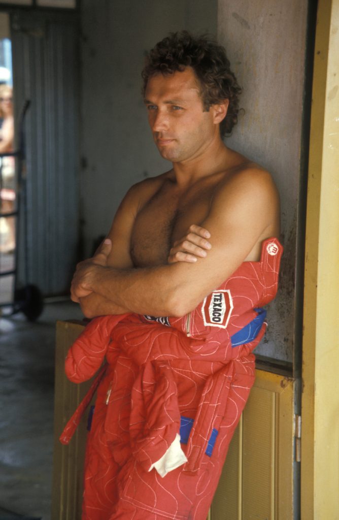 McLaren-Ford driver Jochen Mass relaxing in the pits before practice for the 1976 French Grand Prix at Paul Ricard. Photo: Grand Prix Photo