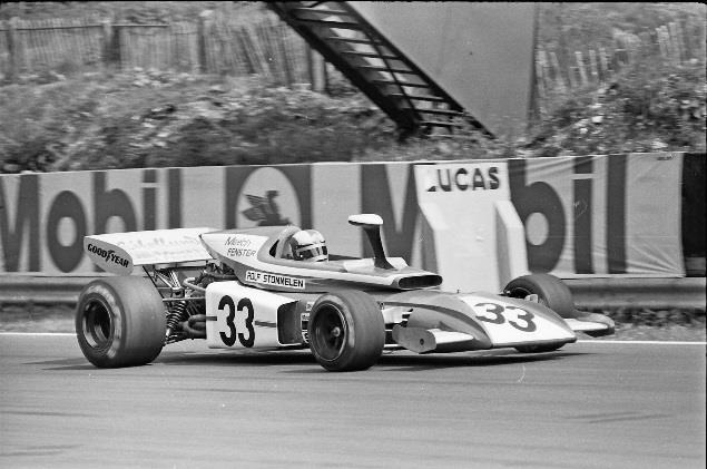 Rolf Stommelen at the wheel of the futuristic Eifelland March 721. Note the periscope rear mirror and the cockpit surround