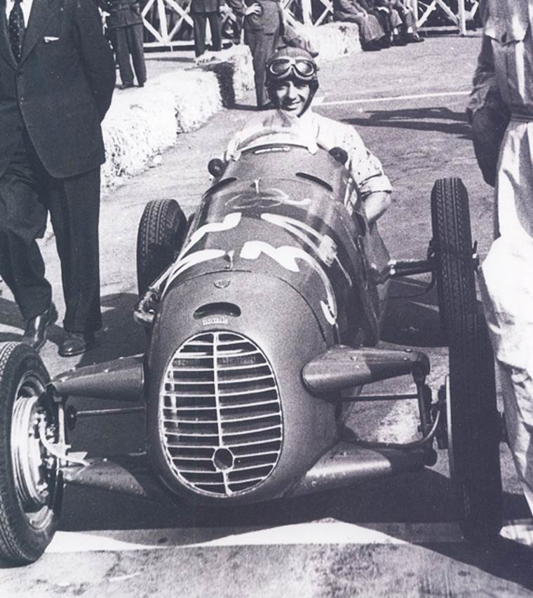 Robert Manzon at the wheel of the little Cisitalia T46