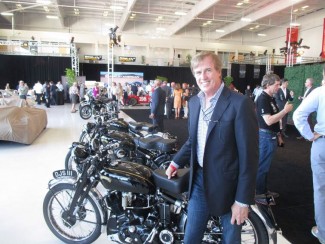 Former Indianapolis winner and Tyrrell grand prix driver Danny Sullivan still has an interest in motorcycles. Here he guards this immaculate Vincent HRD which forms part of his own personal collection. He even has his own registration number featuring his initials DJS III .