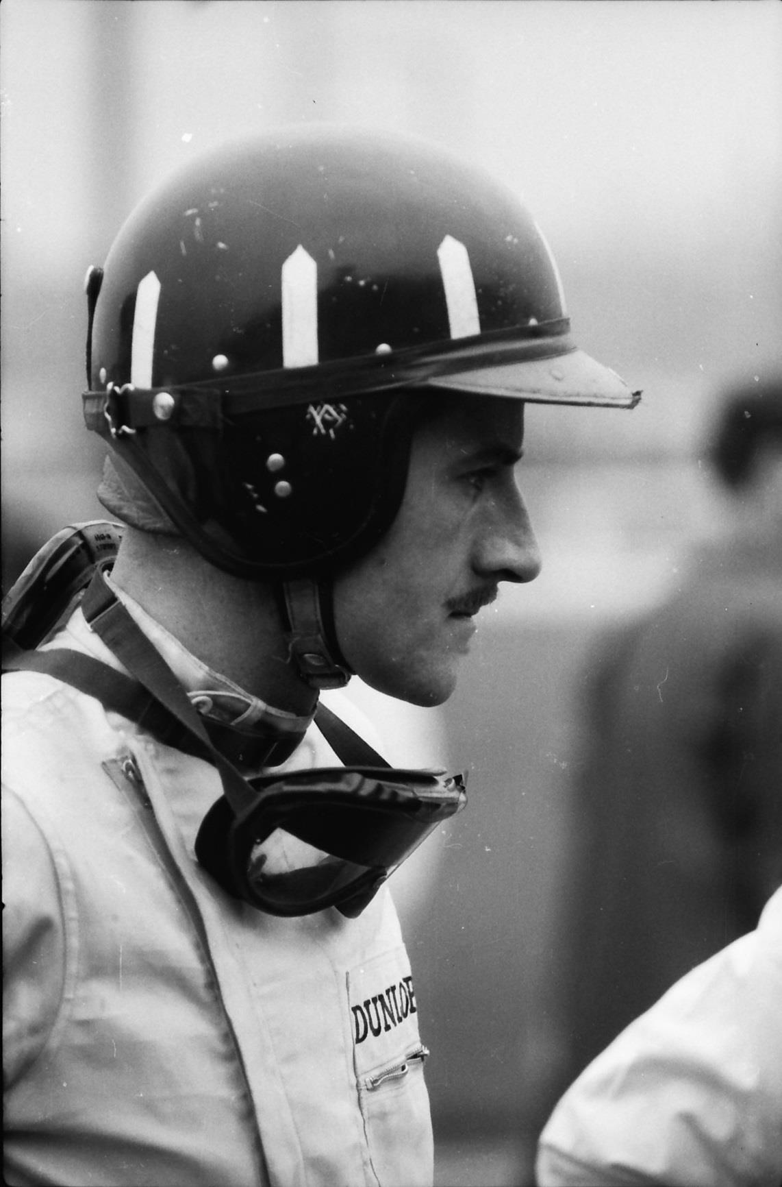 Graham Hill with his familiar London Rowing Club helmet